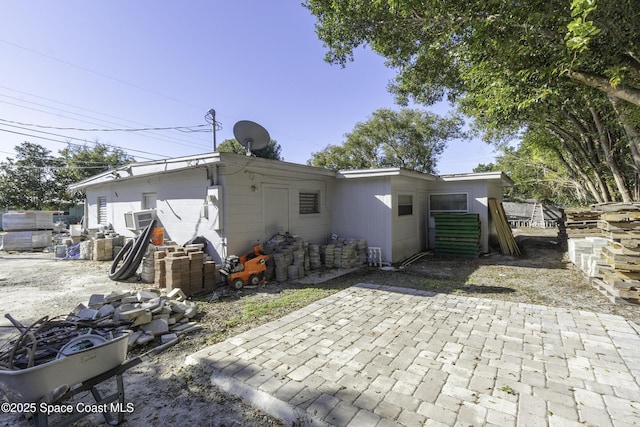 rear view of house with a patio area