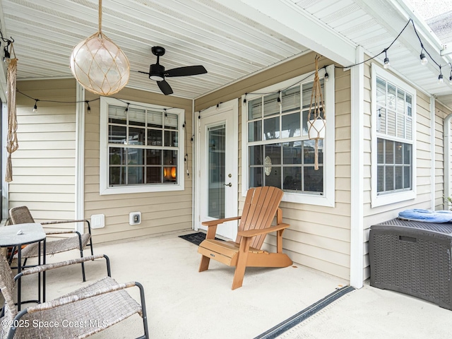 view of patio / terrace featuring ceiling fan