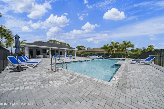 view of pool featuring a patio area