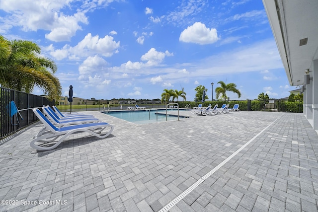 view of pool featuring a patio