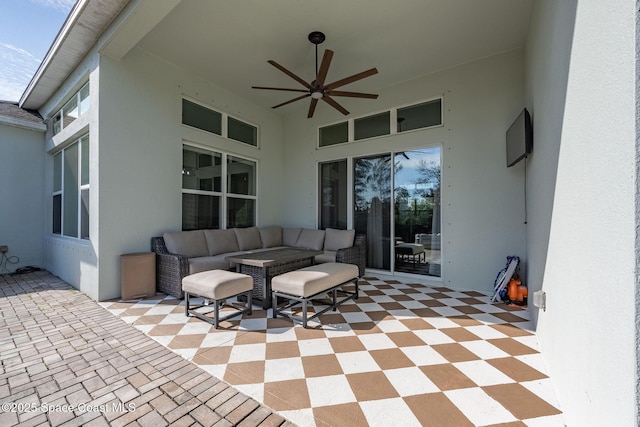 view of patio / terrace with outdoor lounge area and ceiling fan