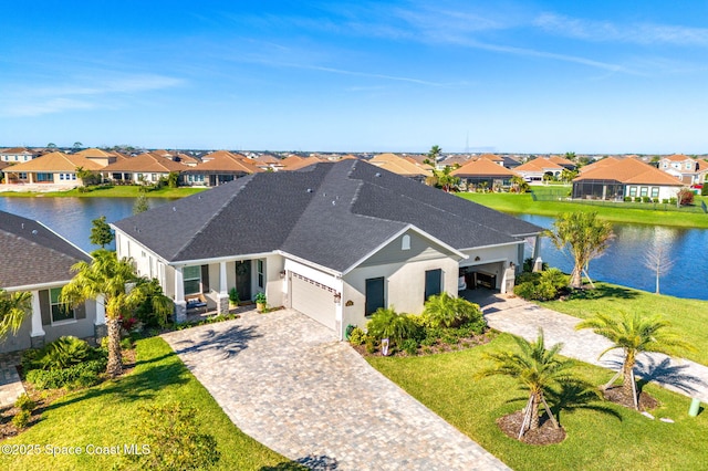 view of front of house featuring a water view and a front yard