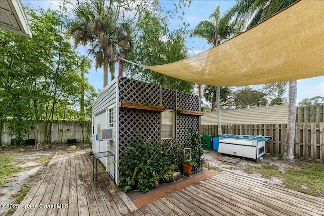 wooden deck featuring a swimming pool