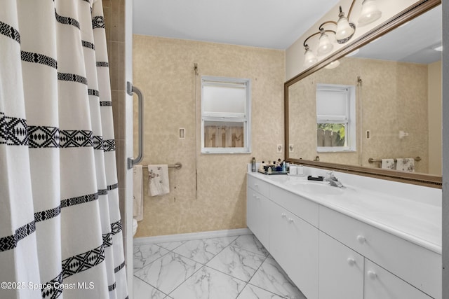 bathroom with a shower with curtain and vanity