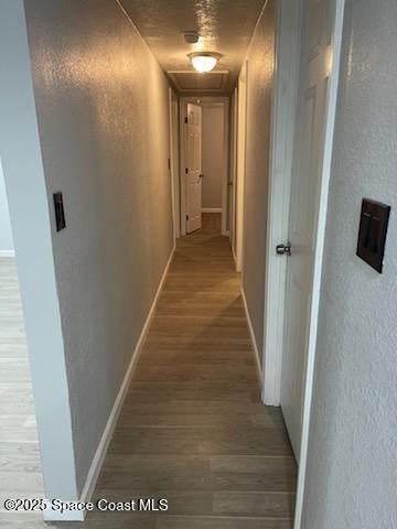 hall featuring hardwood / wood-style flooring