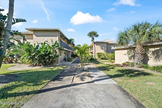 exterior space with a front yard