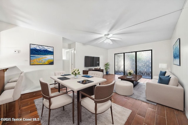 dining room featuring ceiling fan