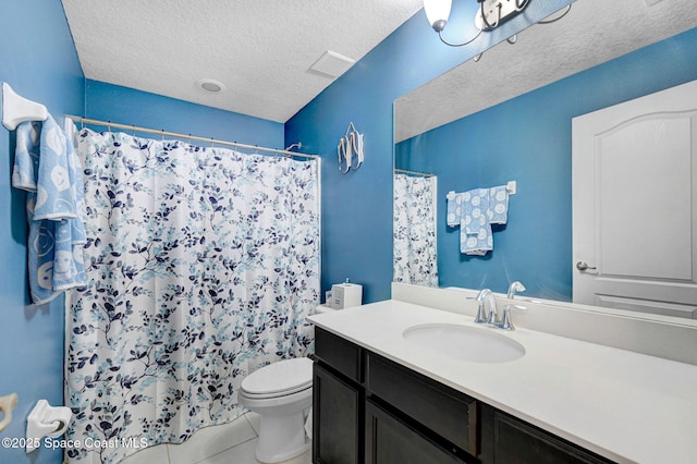 bathroom with toilet, vanity, tile patterned flooring, a textured ceiling, and curtained shower