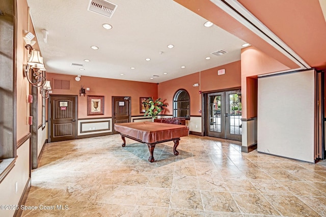 recreation room featuring billiards and french doors