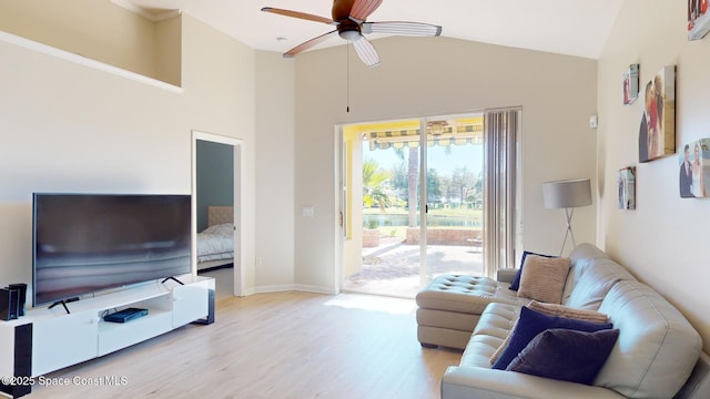 living room featuring light wood-type flooring, ceiling fan, and lofted ceiling