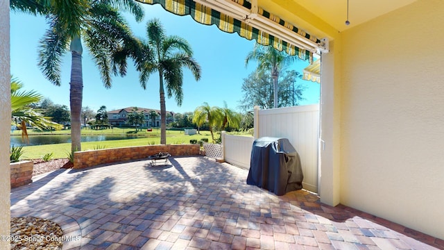 view of patio / terrace featuring a water view