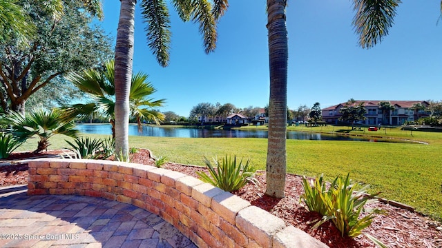 view of yard with a water view