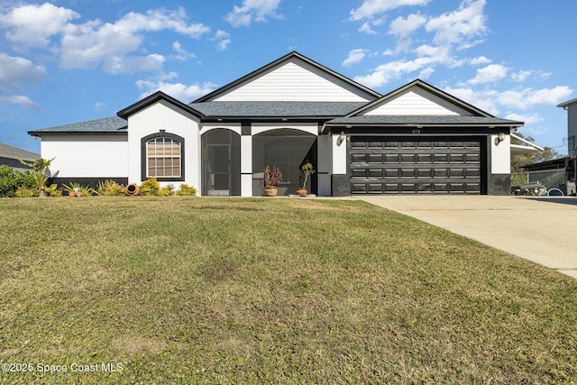 single story home with a front yard and a garage