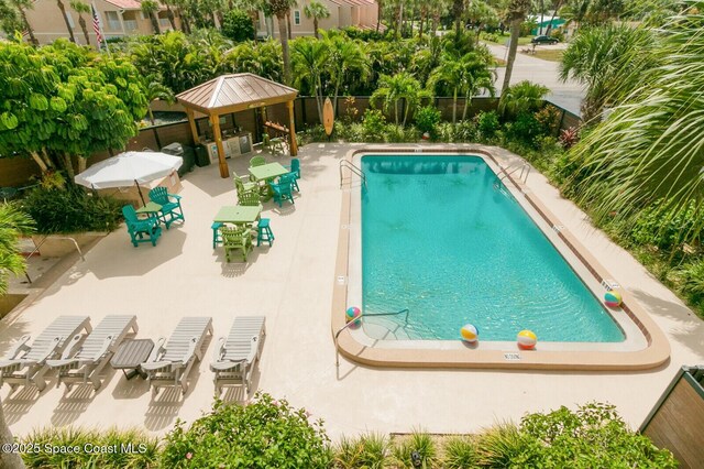 view of pool featuring a gazebo and a patio