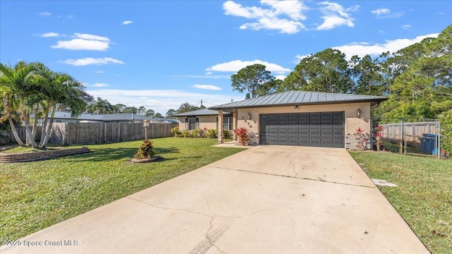 ranch-style home featuring a front yard and a garage