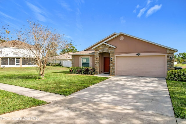 view of front of home with a front yard and a garage