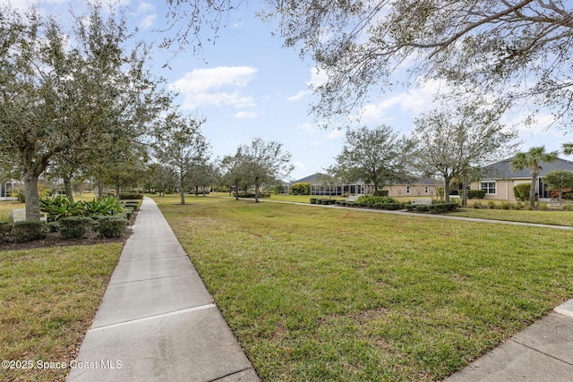 view of community with a lawn