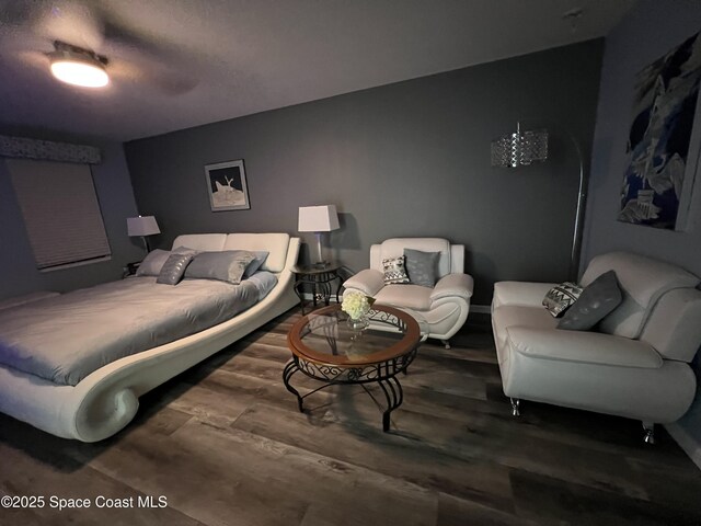 bedroom featuring hardwood / wood-style flooring and ceiling fan