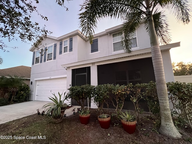 view of front of property with a garage