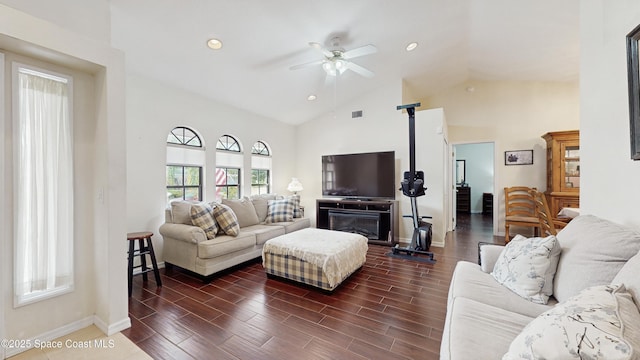 living room with high vaulted ceiling and ceiling fan