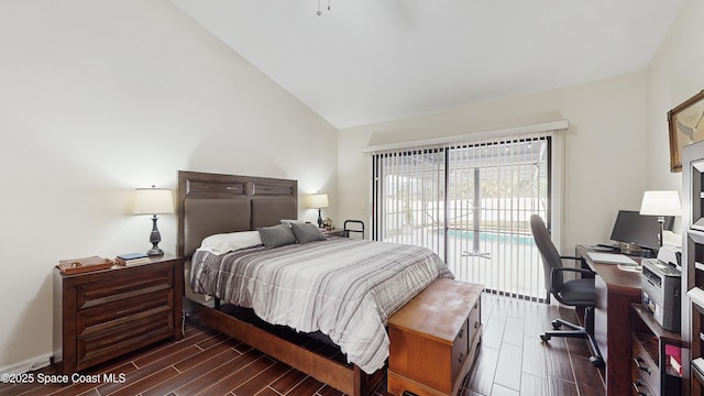 bedroom featuring access to exterior and vaulted ceiling