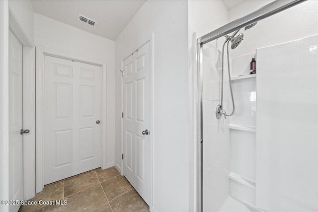 bathroom featuring an enclosed shower