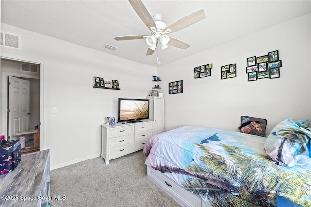 bedroom featuring ceiling fan and light carpet