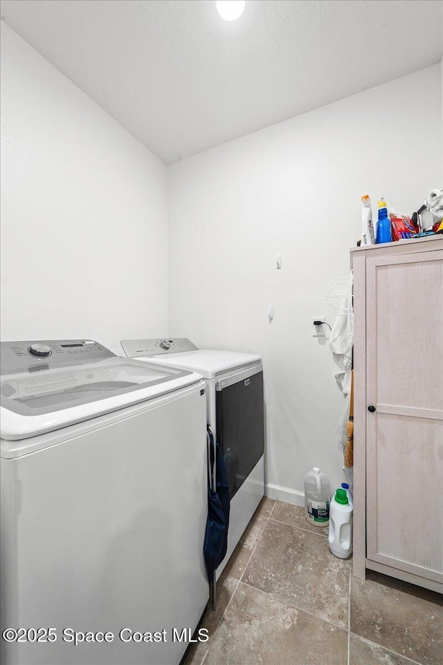 laundry area featuring washing machine and dryer