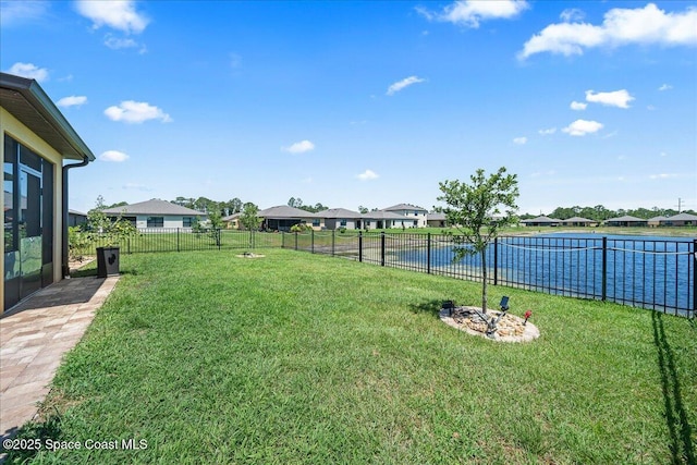 view of yard with a water view