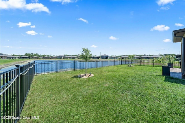 view of yard featuring a water view