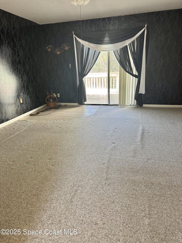 empty room with a textured ceiling