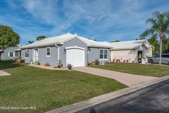 ranch-style home with a garage and a front yard