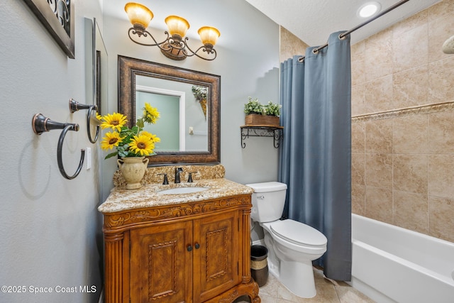 full bathroom with tile patterned flooring, vanity, toilet, and shower / tub combo