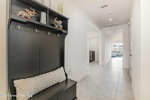 mudroom featuring light tile patterned floors