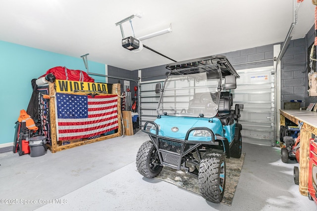 garage featuring a garage door opener