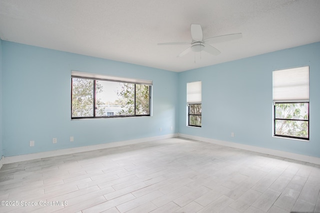 spare room featuring ceiling fan