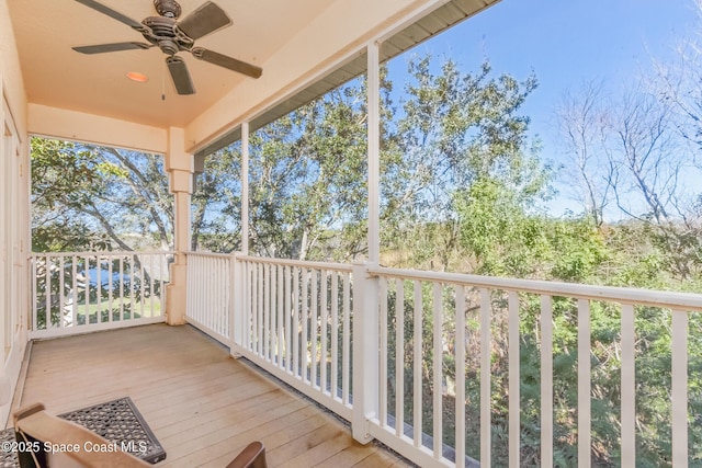 wooden terrace with ceiling fan