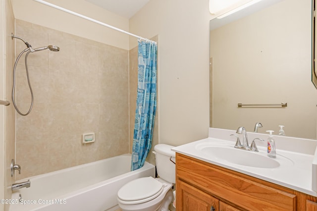 full bathroom with shower / bath combo with shower curtain, vanity, and toilet