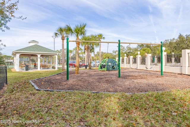 view of play area featuring a gazebo and a lawn