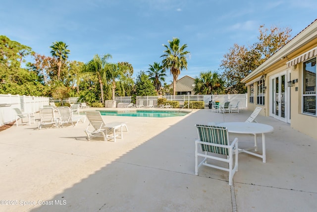 view of pool featuring a patio