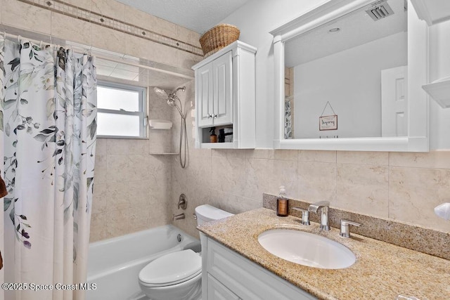 full bathroom with decorative backsplash, shower / bath combination with curtain, vanity, and toilet