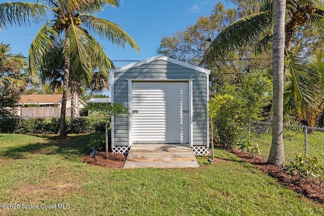 view of outdoor structure featuring a yard