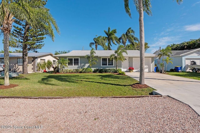 ranch-style house with a front yard and a garage