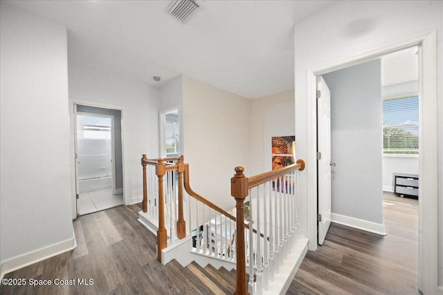 hall with dark hardwood / wood-style floors