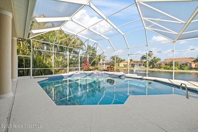 outdoor pool featuring a lanai, a patio area, and a water view