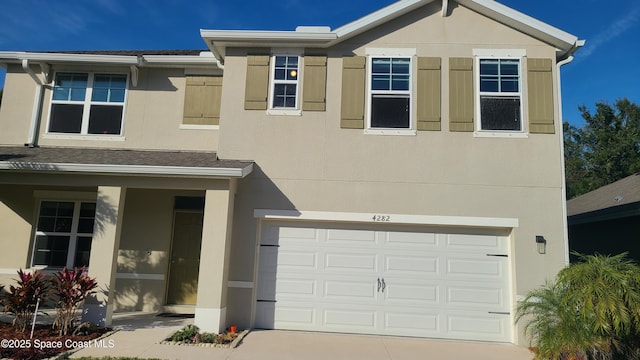 view of front of house with a garage