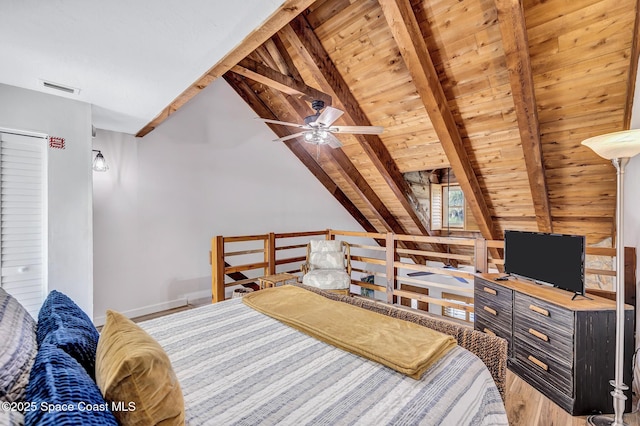 bedroom with hardwood / wood-style floors, ceiling fan, vaulted ceiling with beams, and wood ceiling