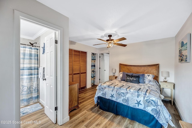 bedroom with ceiling fan, light wood-type flooring, and a closet