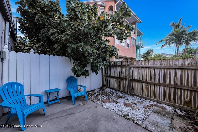 view of patio / terrace featuring radiator heating unit