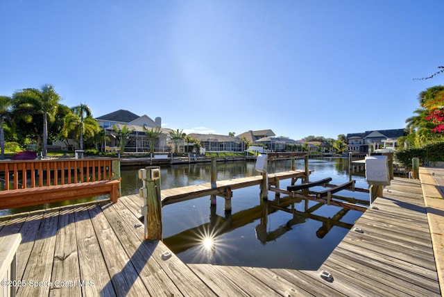 dock area featuring a water view